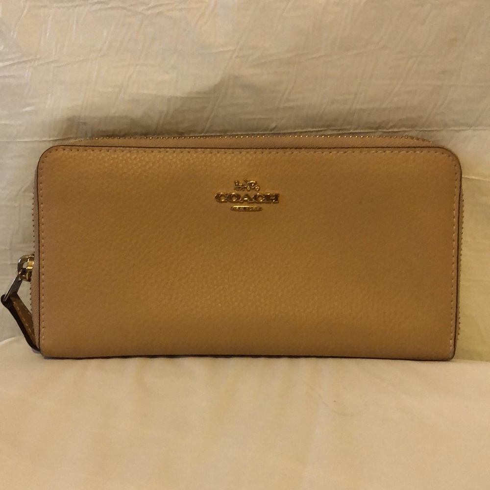 Coach Accordion wallet; tan polished crossgrain pebble leather; never used.